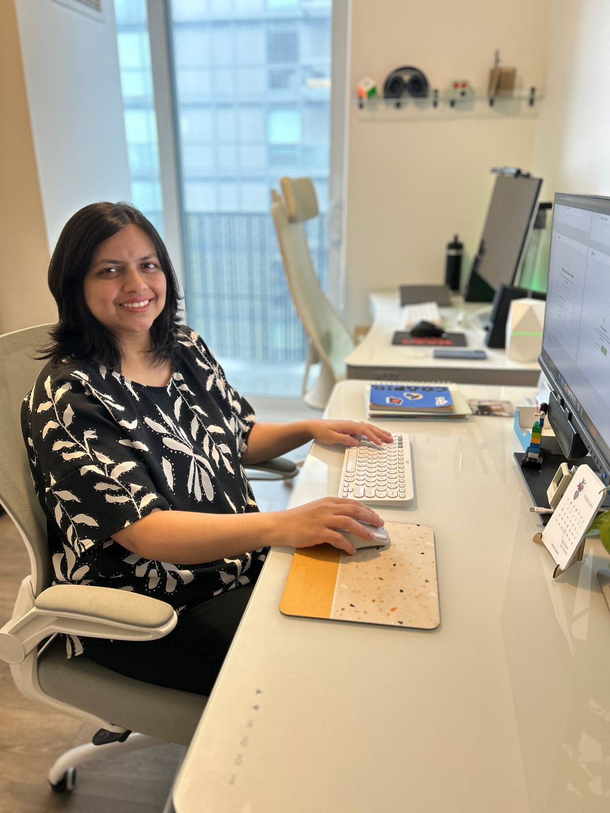 Manasi Lele at her desk